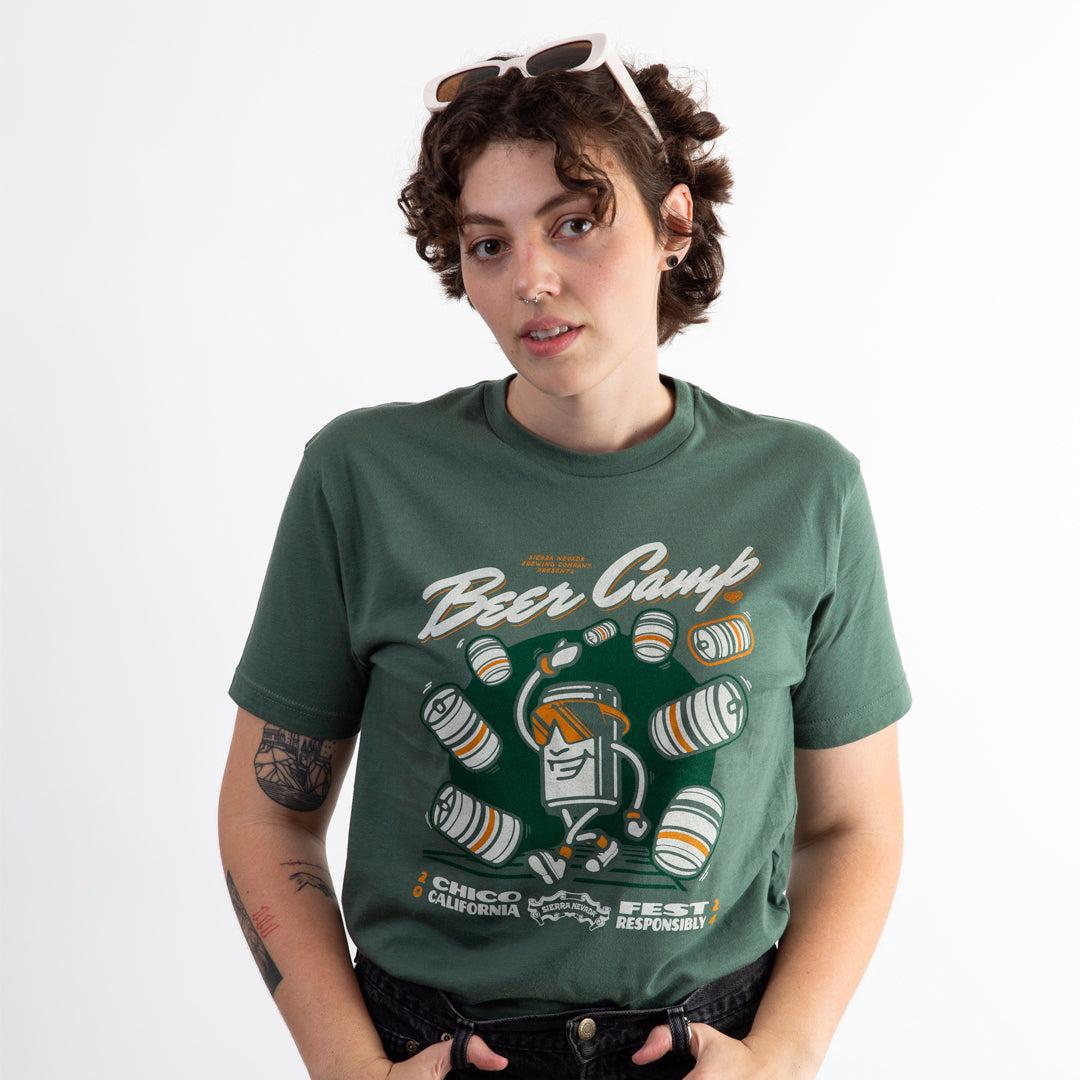 A model wearing the 2024 Beer Camp t-shirt tucked into jeans