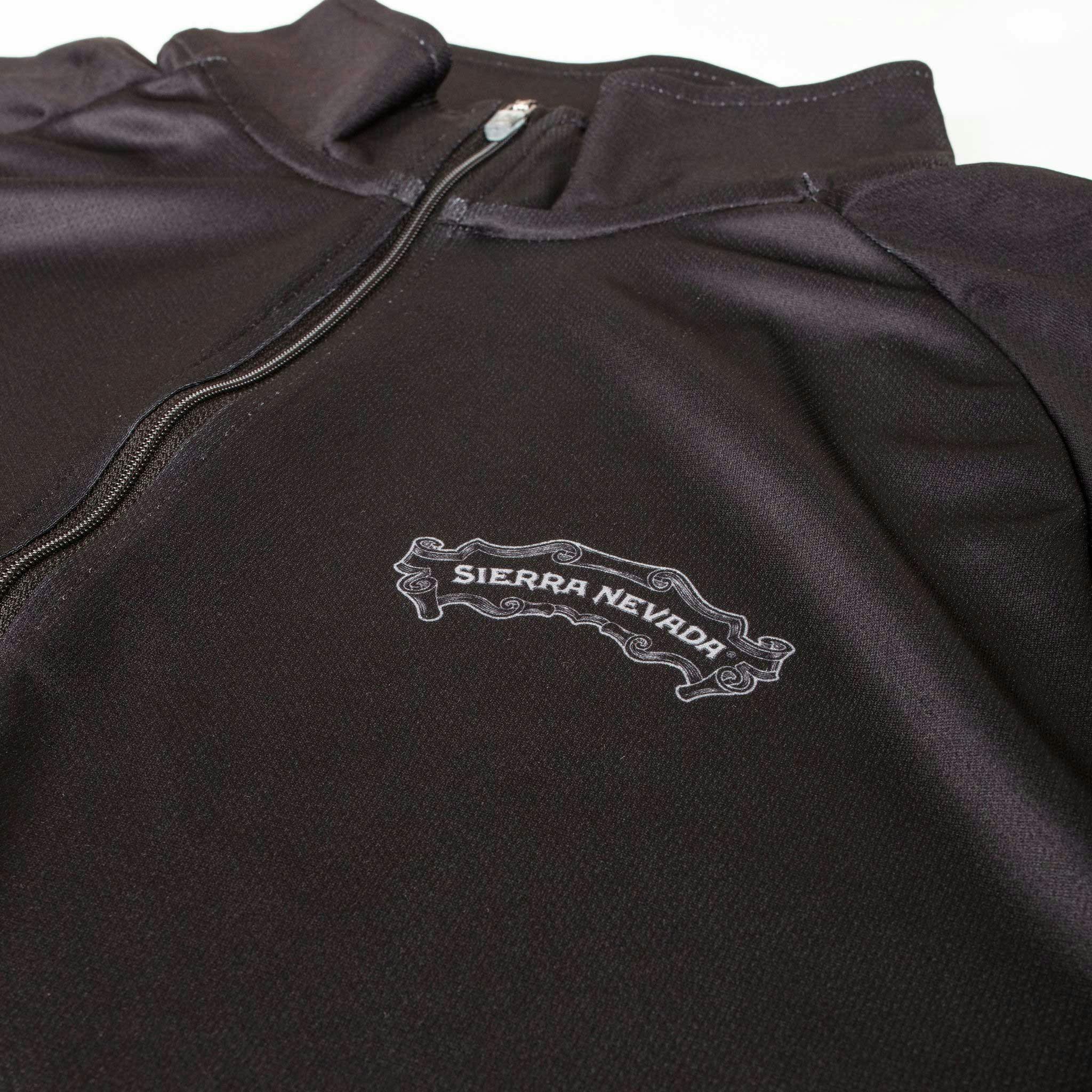 Chest logo detail on the Sierra Nevada Recover Sport Quarter Zip performance top