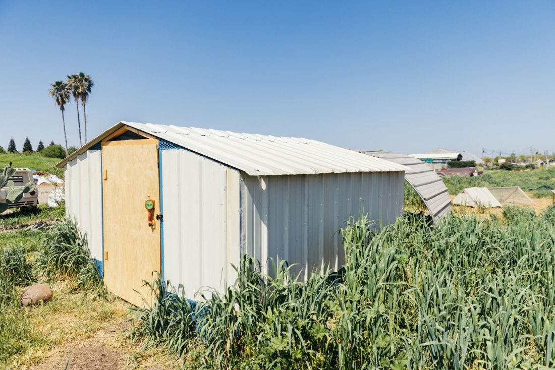 the outside of a chicken coop