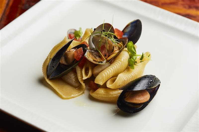 Shellfish dished plated on a white table